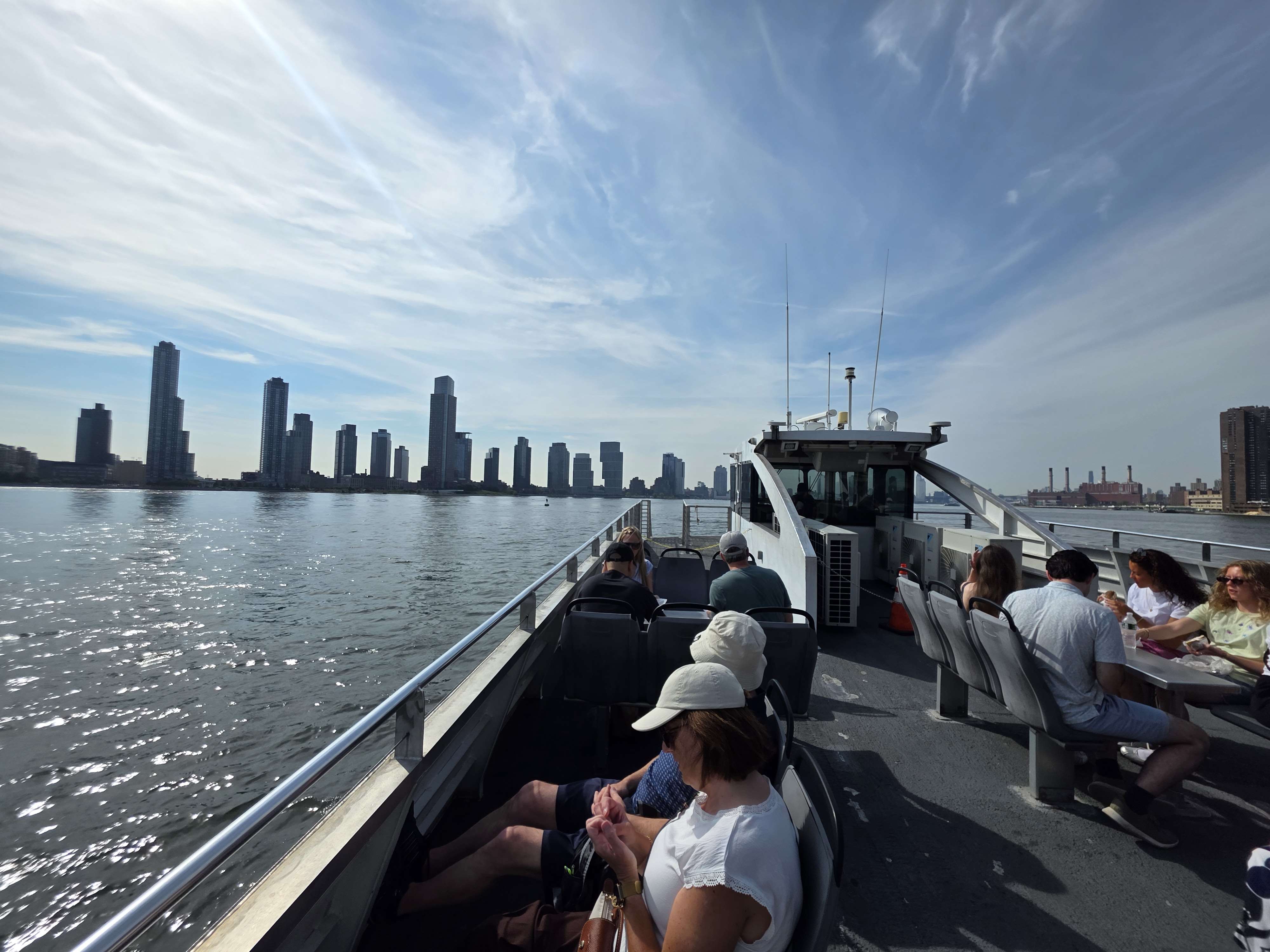 The Manhattan skyline seen from the open deck of the ferry.